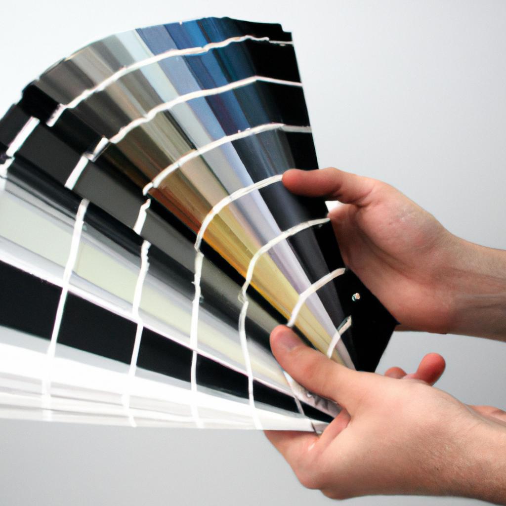 Person holding color swatches