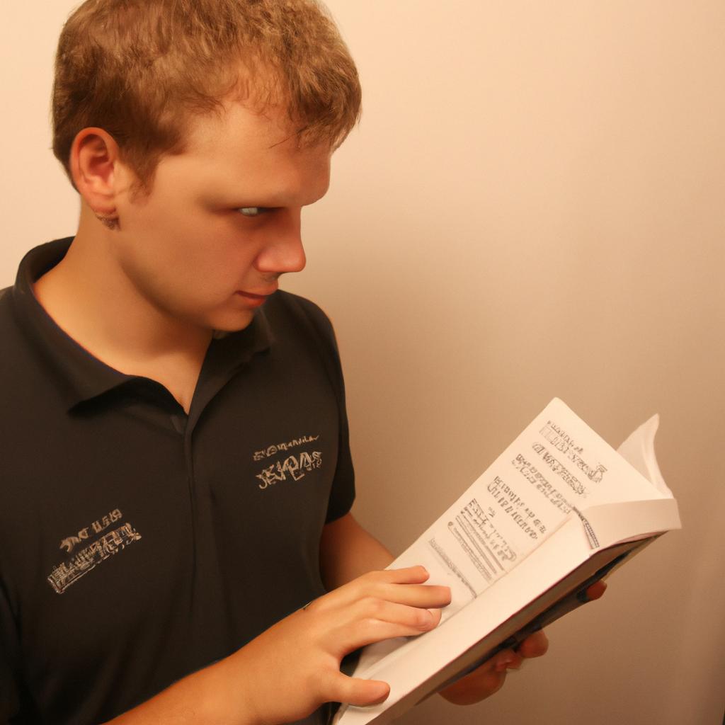 Person reading instruction manual attentively